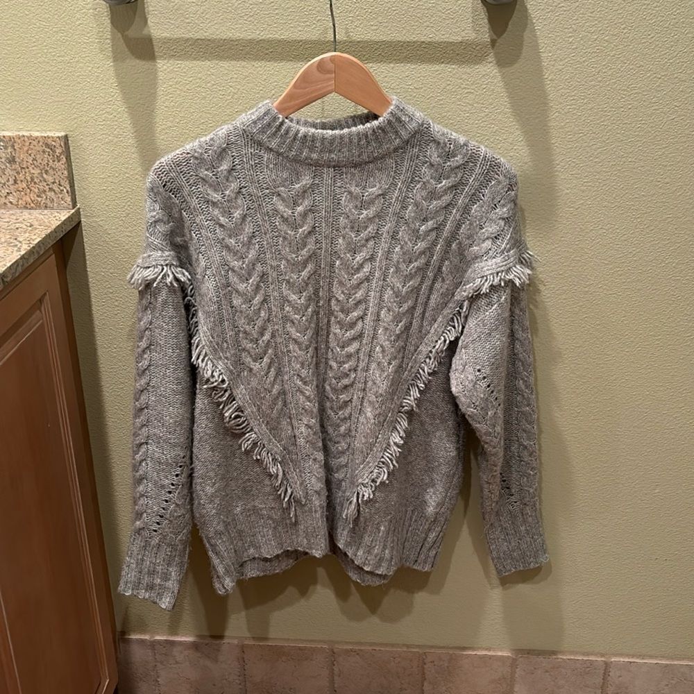 Woman's gray super soft fringe sweater